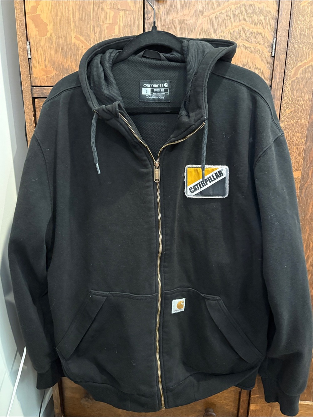 Carhartt Black Zip-Up Hoodie with Yellow Caterpillar Patch